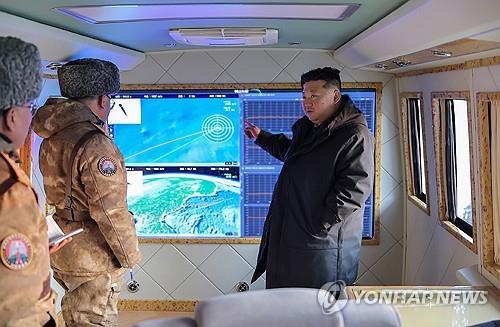 (LEAD) N. Korea says it tested hypersonic missiles with leader Kim Jong-un attending