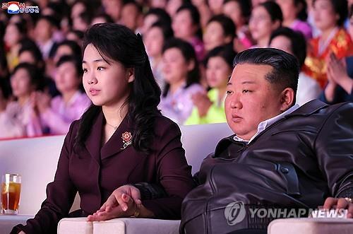 N. Korea's Kim attends concert marking Int'l Women's Day with wife, daughter